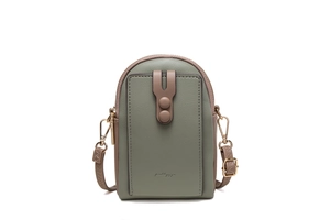 Detail view of lychee-textured faux leather crossbody phone bag with color-block design