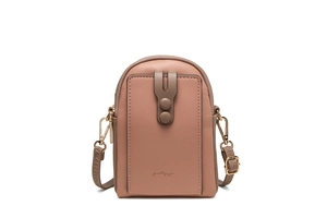 Detail showing high-quality lychee textured leather and golden metal zipper of phone bag