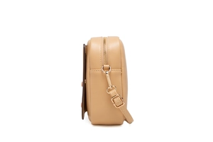 Detail view of the beige crossbody bag showing golden metal zipper and smooth leather texture