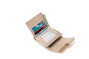 Detail view of the beige multi-slot leather wallet interior showing card slots and ID window