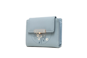 Detail of light blue PU leather purse with flower prints and golden metal buckle logo