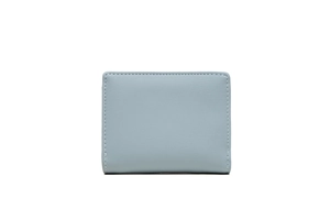 Detailed view of dusty blue PU leather wallet with white stitching and fine texture