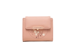 Close-up of matte pink PU leather wallet with white floral print and metal brand plate