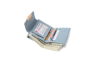 Internal view of light blue tri-fold wallet with card slots and transparent ID window