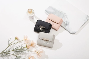 Short PU leather wallets for women featuring floral prints and stylish metal hardware