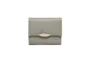 Detail of grey short wallet with silver metal feather clasp and white contrast stitching