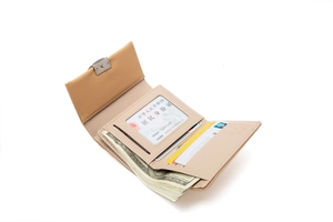 Detail view of tri-fold leather wallet showing interior card slots and cash compartment