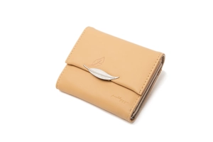Close-up of khaki tri-fold wallet featuring silver leaf clasp and textured leather detail