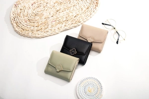 Three-fold PU leather women's wallets with clover metal buckle in various colors
