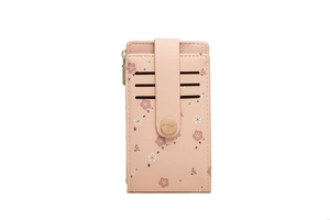 Detail of pink floral card holder showing multiple card slots and gold zipper closure