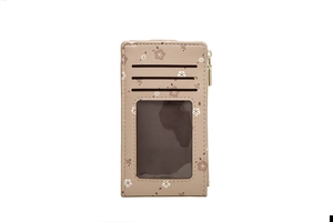 Detail view of khaki card holder with floral print featuring card slots and zipper pocket