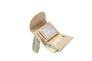 Detail view of beige tri-fold leather wallet showing card slots and ID window