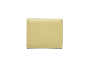 Detail of light olive green faux leather wallet showing fine texture and neat stitching