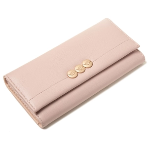 Close-up of pink leather wallet featuring three golden leaf engraved metal buttons