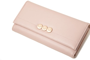 Detail of light pink PU leather wallet featuring rose gold leaf-engraved snap buttons