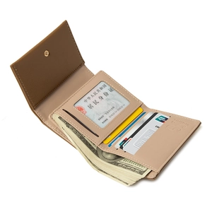 Short tri-fold women's wallet with multiple card slots and leather texture in brown