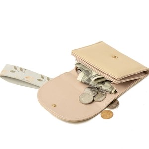 Short PU leather wallet for women in soft apricot pink with floral printed wrist strap