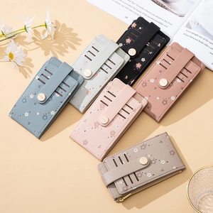 Floral print slim card wallet with zipper pocket and button closure in multiple colors