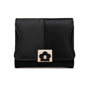 Detail view of black PU leather wallet with a golden floral metal buckle and fine stitching