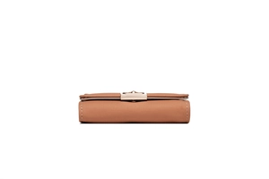 Close-up of brown PU leather wallet with golden metal buckle and white stitching detail