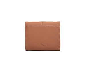 Detail of a brown leather wallet featuring white contrast stitching and embossed logo