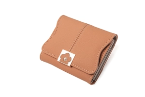 Detail view of khaki tri-fold wallet featuring contrast stitching and a floral gold buckle
