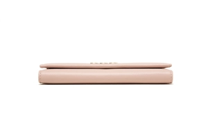 Close-up side view of light pink leather long wallet with gold logo and fine stitching