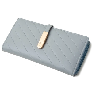 Long light blue women's clutch wallet with quilted stitching and gold buckle
