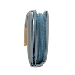 Detailed side view of light blue leather wallet with quilted texture and gold zipper