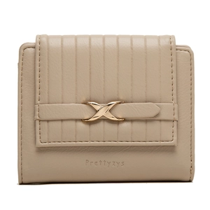 Detail view of tri-fold wallet featuring vertical embossed texture and gold X-shaped clasp