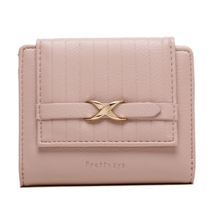 Close-up of light pink leather wallet with litchi texture and gold X-shaped buckle