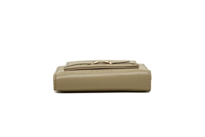 Detail view of olive green PU leather wallet showing side texture and brand engraving