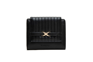 Close-up of black pleated faux leather wallet with a golden X-shaped metal buckle