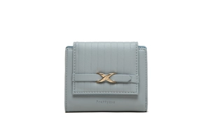 Close-up of light blue trifold wallet featuring lychee texture and gold X-shaped metal clasp