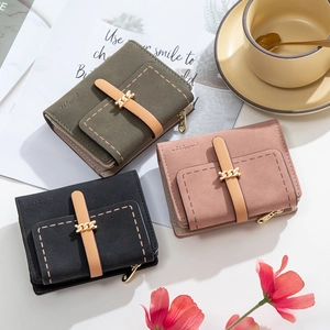 Women's vintage matte trifold wallet with gold buckle closure in green, black and pink