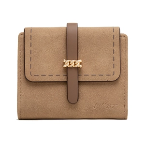 Detail of camel frosted tri-fold wallet showing golden chain buckle and neat stitching