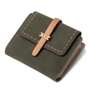 Detail shot of olive green bifold wallet with matte leather finish and gold chain fastener