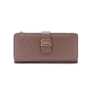 Detail of elegant stitched leather wallet with metallic buckle and top zipper closure