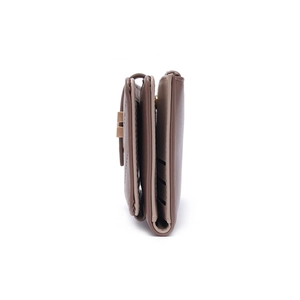 Detail view of the multi-layered folding structure and card slots of the leather wallet
