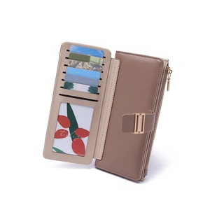 Macro view of khaki tri-fold long wallet featuring five card slots and one ID window
