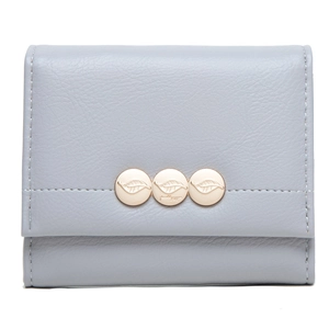 Detail of light blue tri-fold leather wallet with fine grain and golden metal leaf buckles