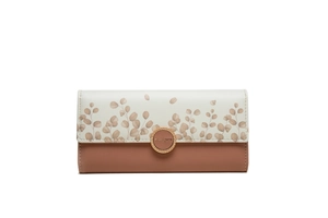 Detail of bifold long wallet showing floral print, contrast panels, and gold metal buckle