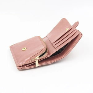 Short tri-fold women's wallet in dark pink oil wax leather with gold zipper pocket