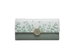 Detailed close-up of the tri-fold long wallet featuring floral print and metal buckle