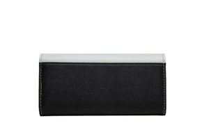 Detailed view of long bi-color leather wallet with black and white contrast stitching