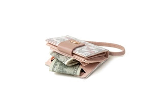 Close-up of pink patchwork leather wallet with card slots and wrist strap