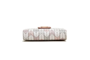 Detail of pink leather buckle and golden metal closure on chevron pattern wallet