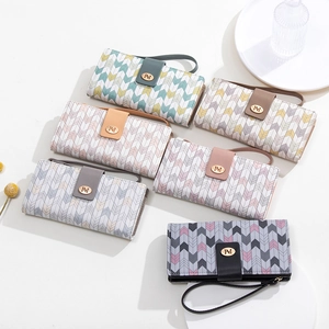 Long PU leather wallets for women with geometric print, wristlet strap, and metal buckle