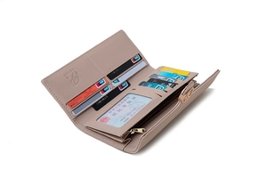 Interior detail of a multi-slot long wallet with leaf buckle and card compartments