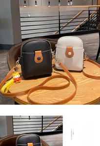 Vertical mini PU leather phone bag with litchi grain texture and crossbody straps